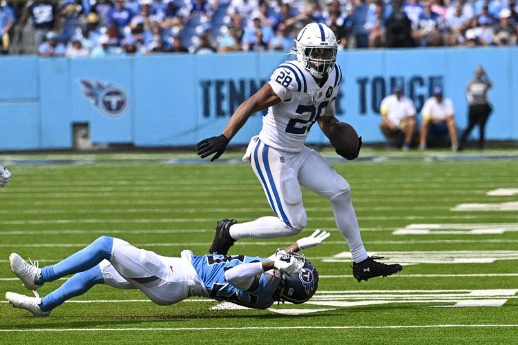 Jonathan Taylor's 3 TDs keeps Colts undefeated with 41-20 thumping of winless Titans