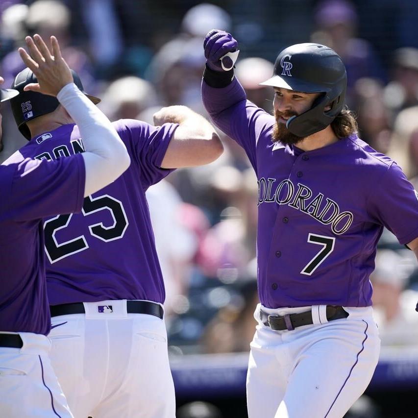 Colorado Rockies' C.J. Cron (25) reacts before the start of a