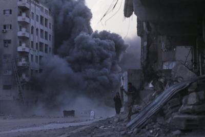 Israel demolishes high-rise building in Gaza City as part of ramped-up offensive