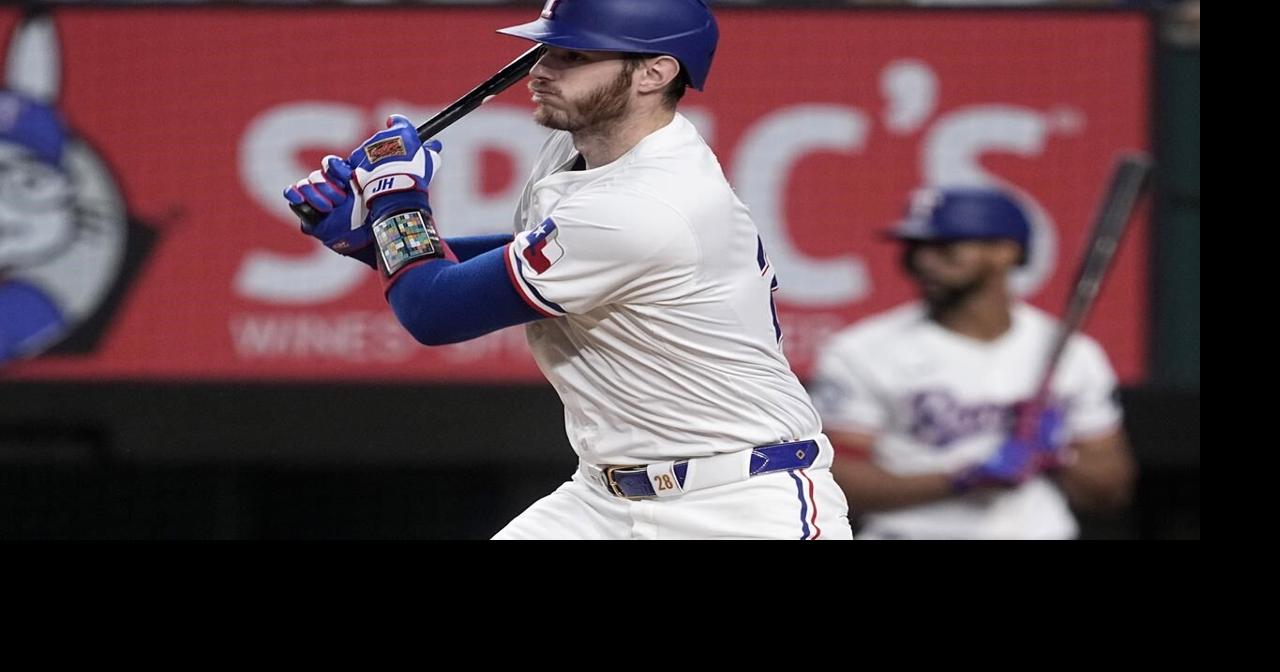 Langford, Heim lead Rangers to wild 13-8 win over Blue Jays