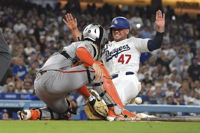 Ohtani gets 2 big hits, Yamamoto and bullpen combine on 1-hitter in Dodgers' 2-1 win over Giants