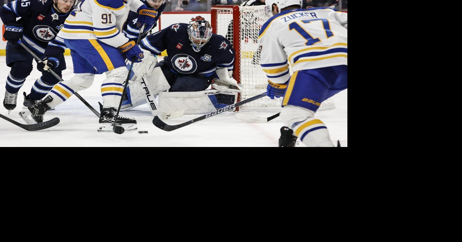 Eric Comrie makes 34 saves, Winnipeg Jets top Buffalo Sabres 4-1