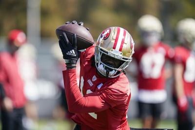 San Francisco 49ers wide receiver Brandon Aiyuk (11) catches a pass during  the first half of an …