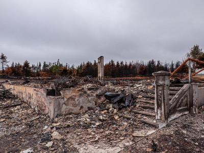 Grief, fear and a vote to move forward mark meeting for Newfoundland fire victims
