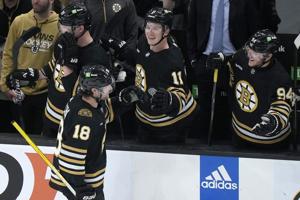 Marchand and Heinen score short-handed, Bruins blank Canucks 4-0 in matchup of NHL’s top 2 teams
