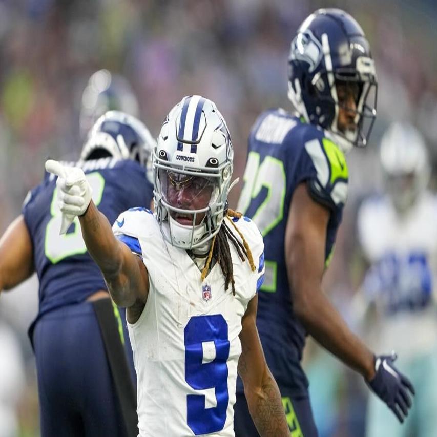 Dallas Cowboys running back Rico Dowdle plunges through a goal-line pileup  for rushing touchdown