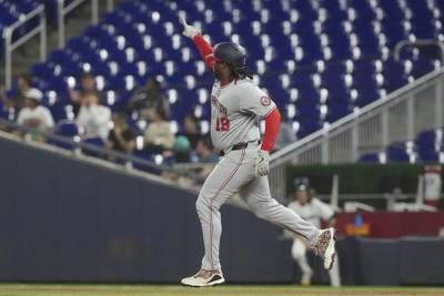 Josh Bell homers again as Nationals hold on to beat Marlins 7-5
