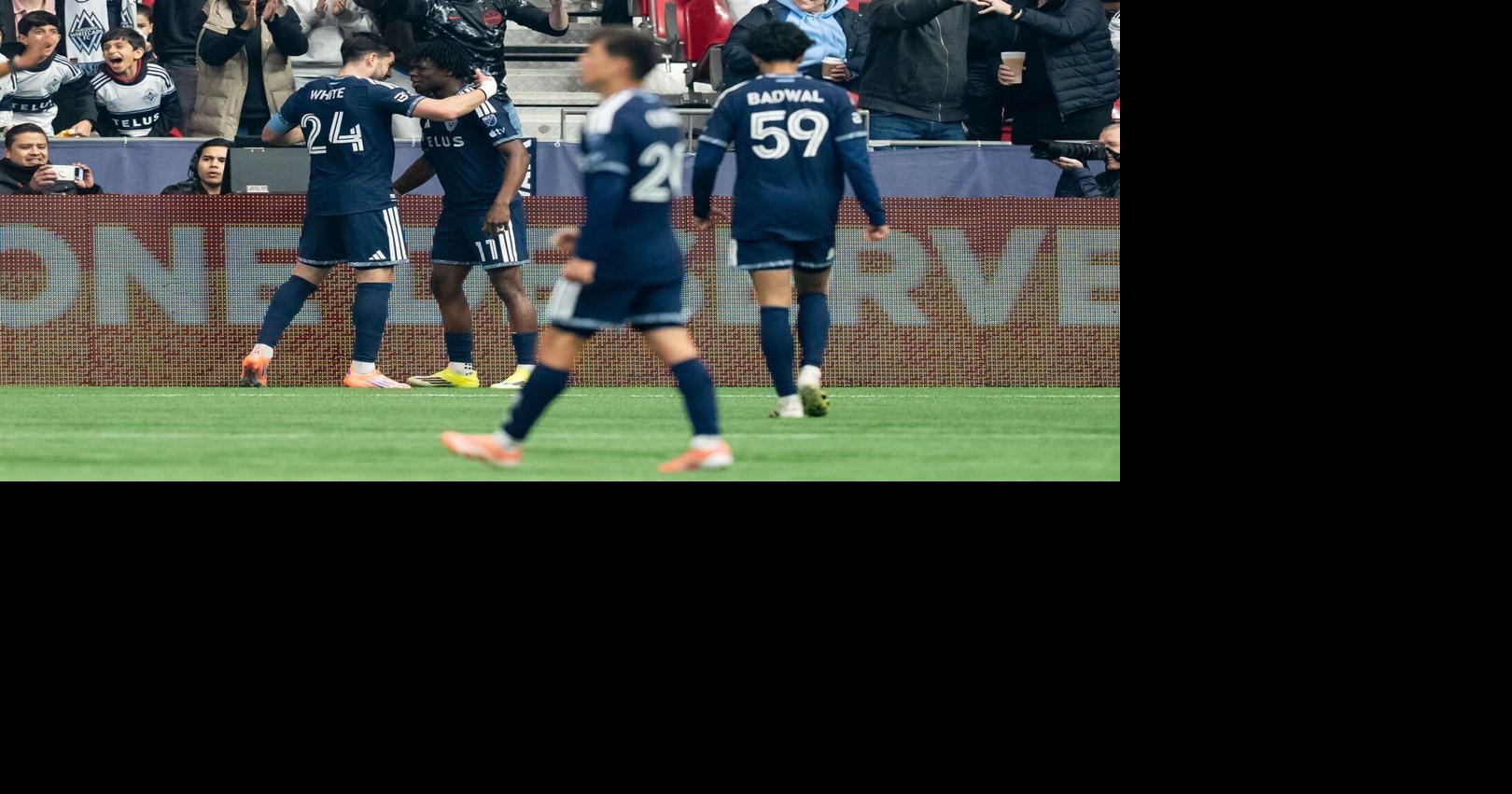Vancouver Whitecaps players celebrating a goal at BC Place