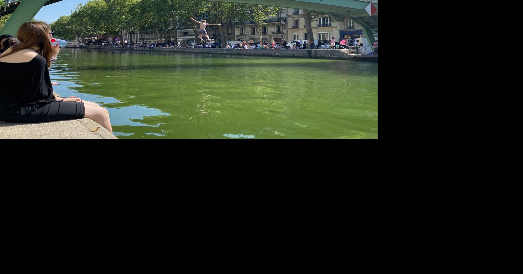 Parisians weather their heat wave with canal dips and water guns