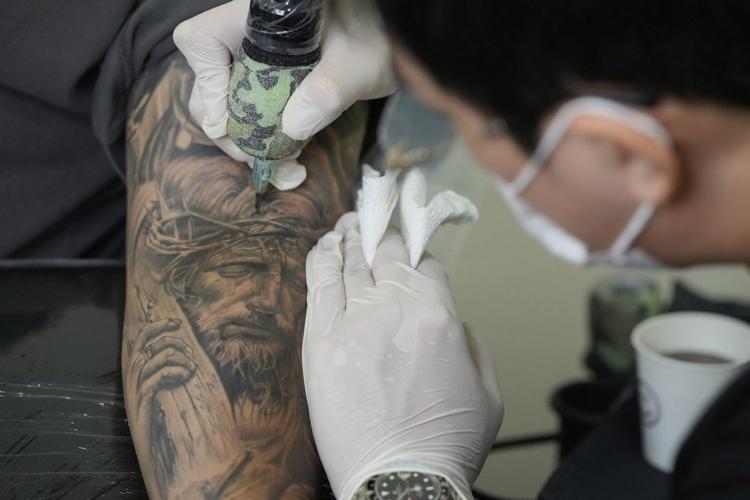 In South Korea, tattoo artists work in the shadows. A new law could soon legalize their jobs