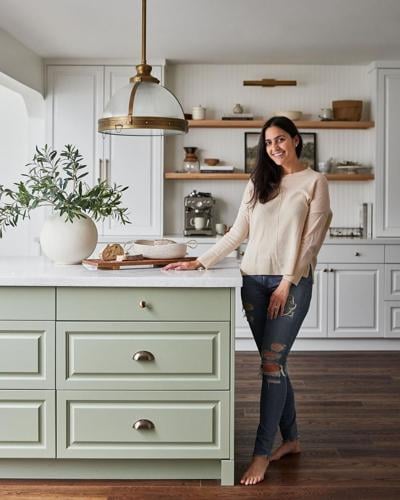 Sage green kitchen with shiplap walls in a Toronto home, Ontario