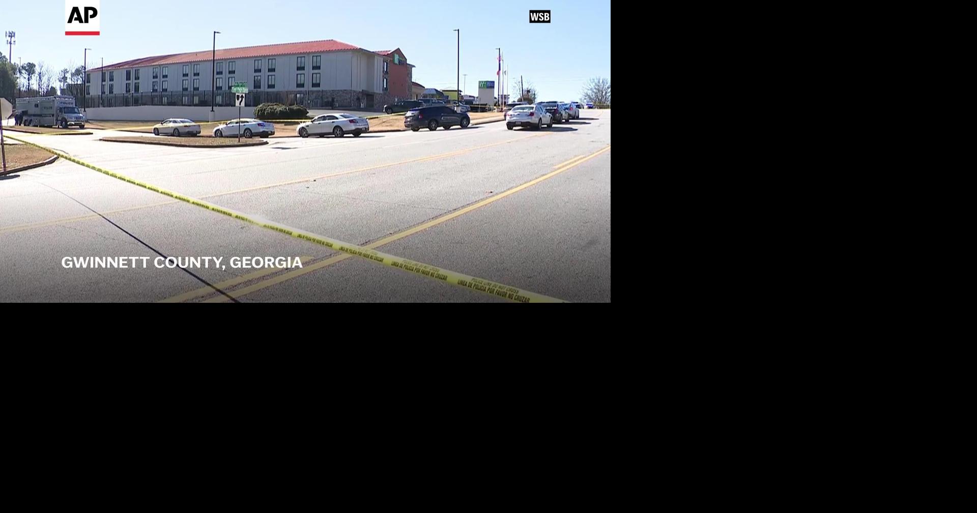 Police officer killed, another seriously wounded in hotel room shootout ...