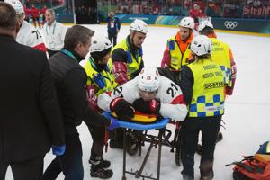 Switzerland's Kevin Fiala out of Olympics with lower-leg injury after getting tangled with Canada's Tom Wilson