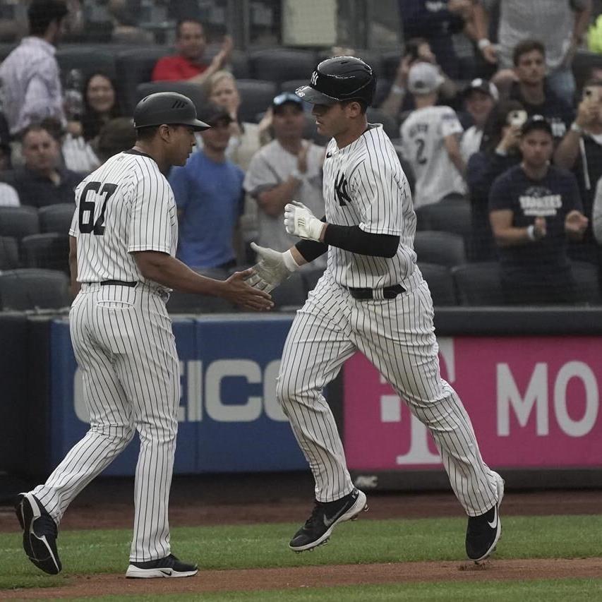 Best-in-MLB Yanks top worst-in-majors A's 9-5 on late rally