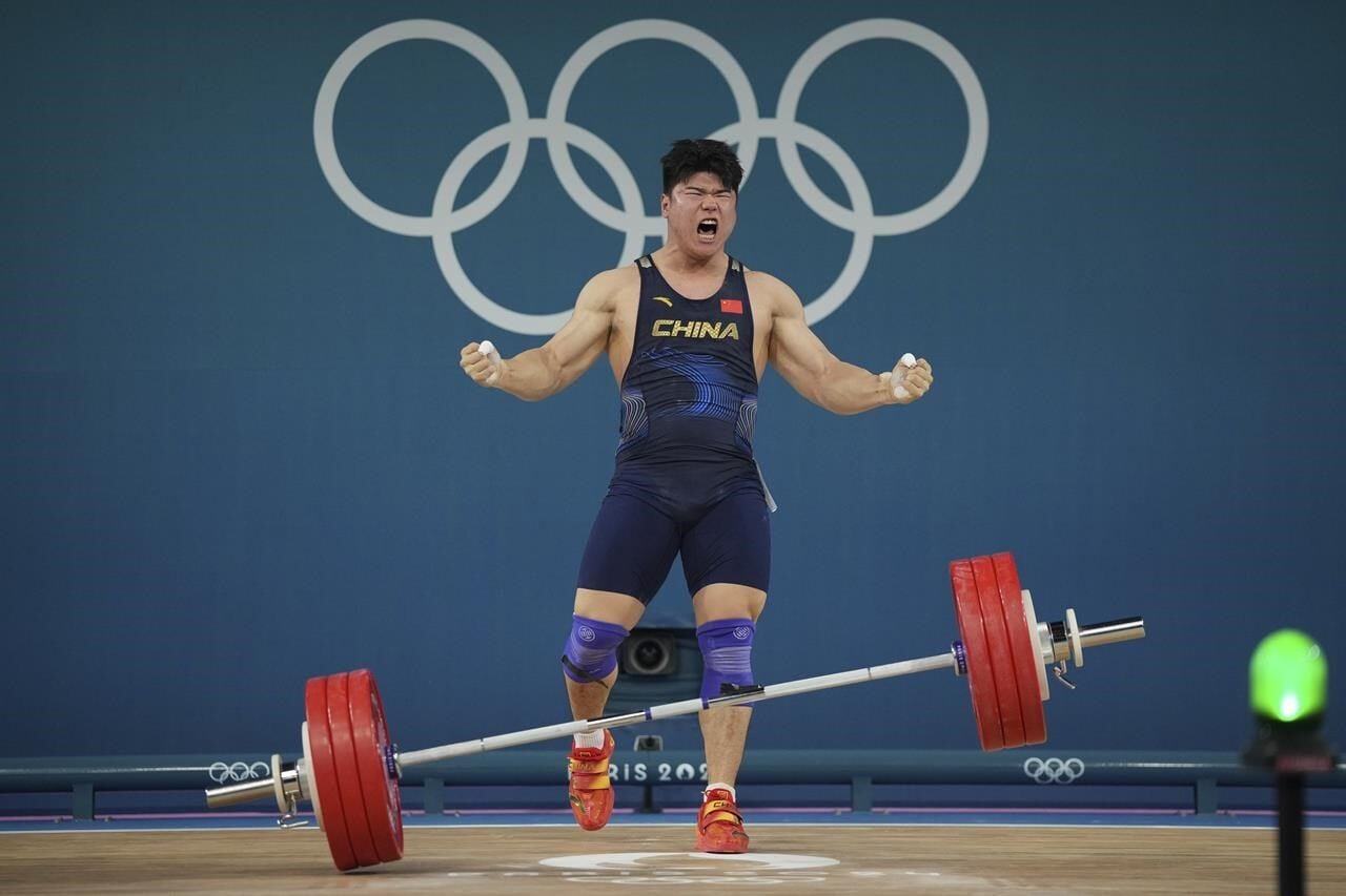 102 Kg Java Rd Lasha Talakhadze of Georgia three-peats as Olympic weightlifting champion