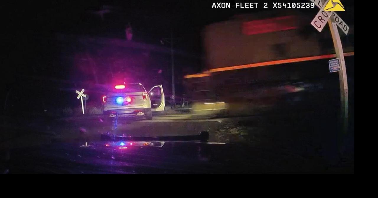 Colorado officer who put suspect in car hit by train found guilty of reckless endangerment