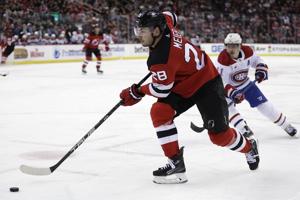 Caufield breaks tie late in 3rd period to lift Canadiens over Devils 3-2