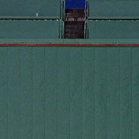 Fenway Park Green Monster Wall - Upper view to the iconic Fenway Park Green  Monster Wall, with the Citgo billboard sign in the background. Fenway Park  is home to the Boston Red