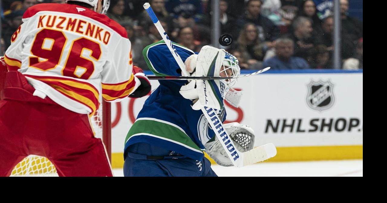 Canucks' Pettersson marks birthday with two points, 3-1 win over Flames