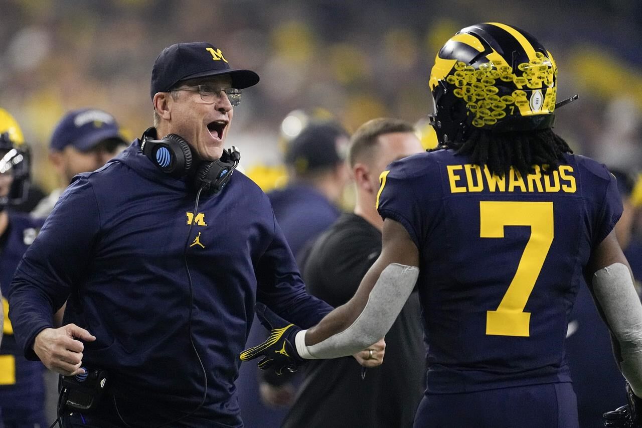 Michigan overpowers Washington 34 13 as Jim Harbaugh delivers a