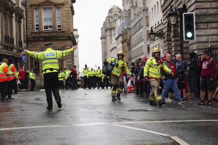 Driver arrested after car plows into celebrating Liverpool fans