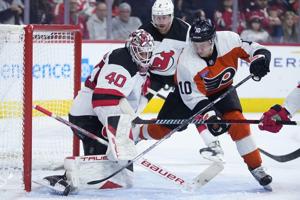 Luke Hughes and Jack Hughes lead Devils past Flyers 4-3 in overtime