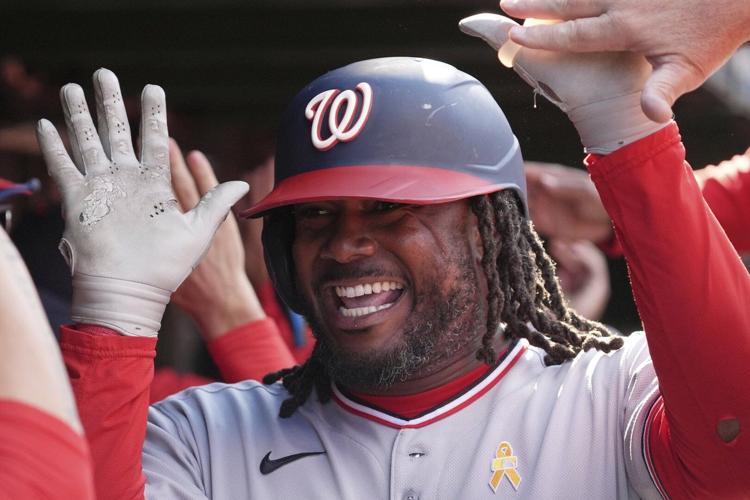Josh Bell homers as Nationals rally with 5 in the 9th to beat Cubs 6-3