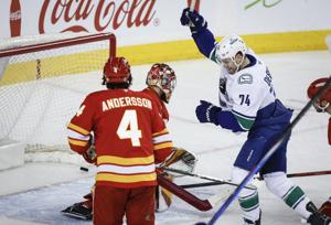 Canucks come back to edge Flames 4-3 in shootout as wild-card race heats up