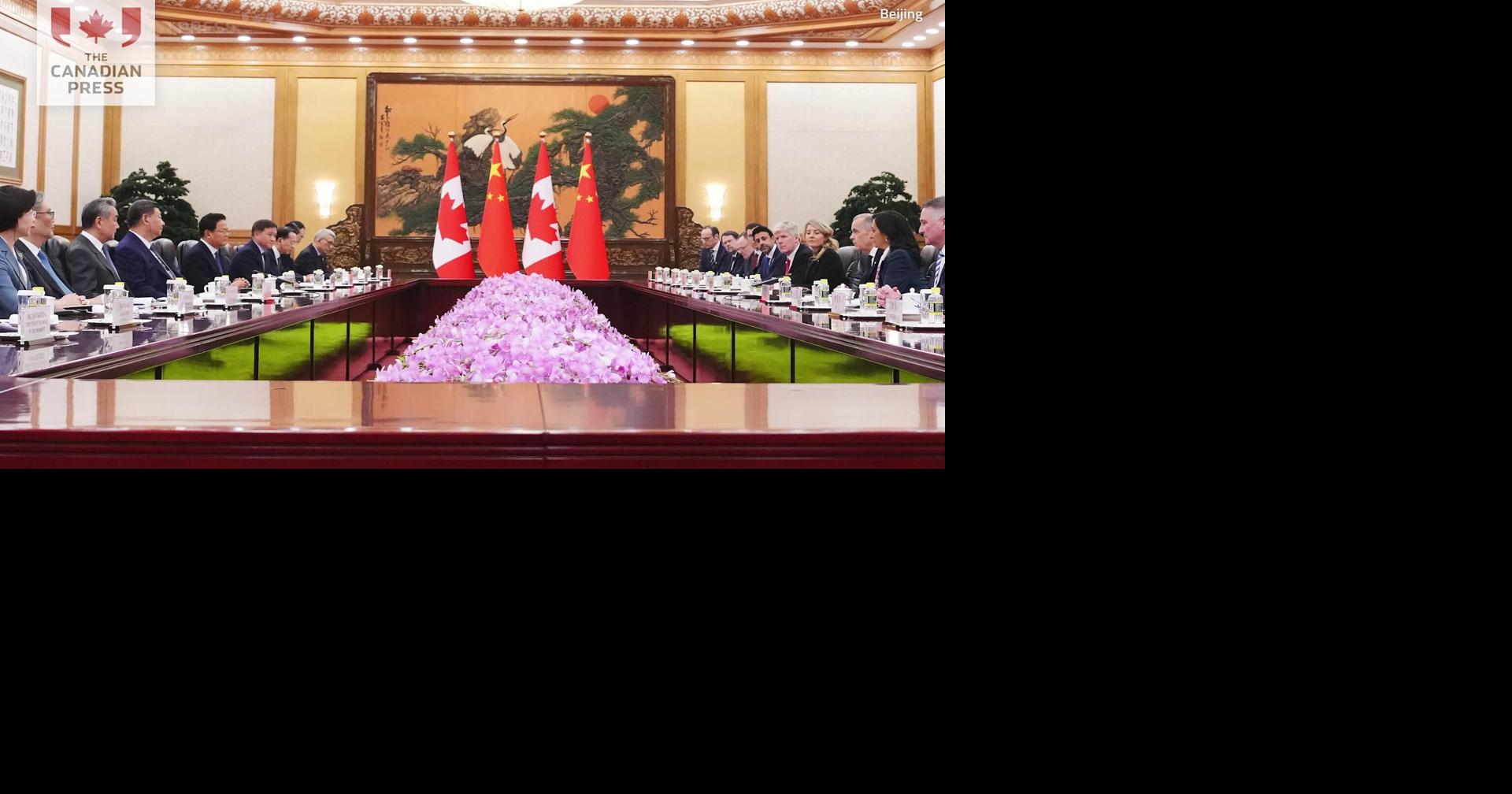 Carney reaches 'landmark' tariff quota deal with China on EVs, canola