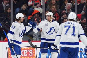 Kucherov scores on 1st 2 shots, Lightning beat Flyers 7-2 for 9th straight win