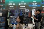 South Korea's central bank hikes rate for 1st time since 2023 to curb inflation, debt