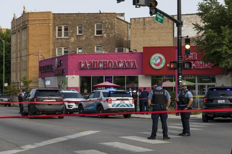 4 injured in drive-by shooting near Chicago high school