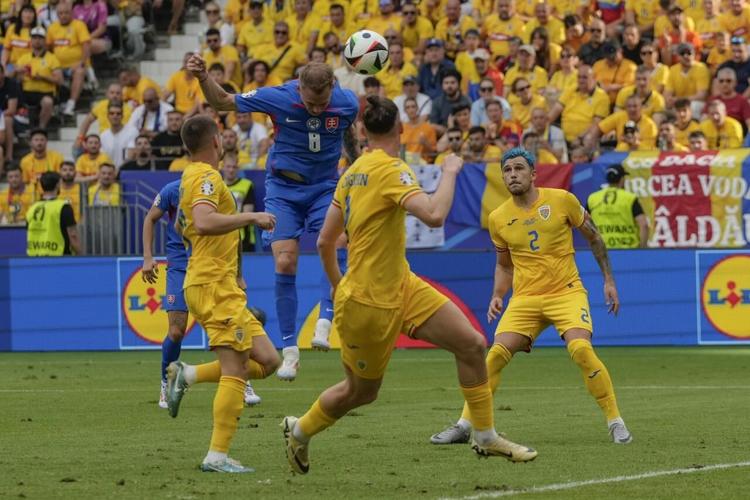 Fueled by feeling insulted, Romania draws 11 with Slovakia to send