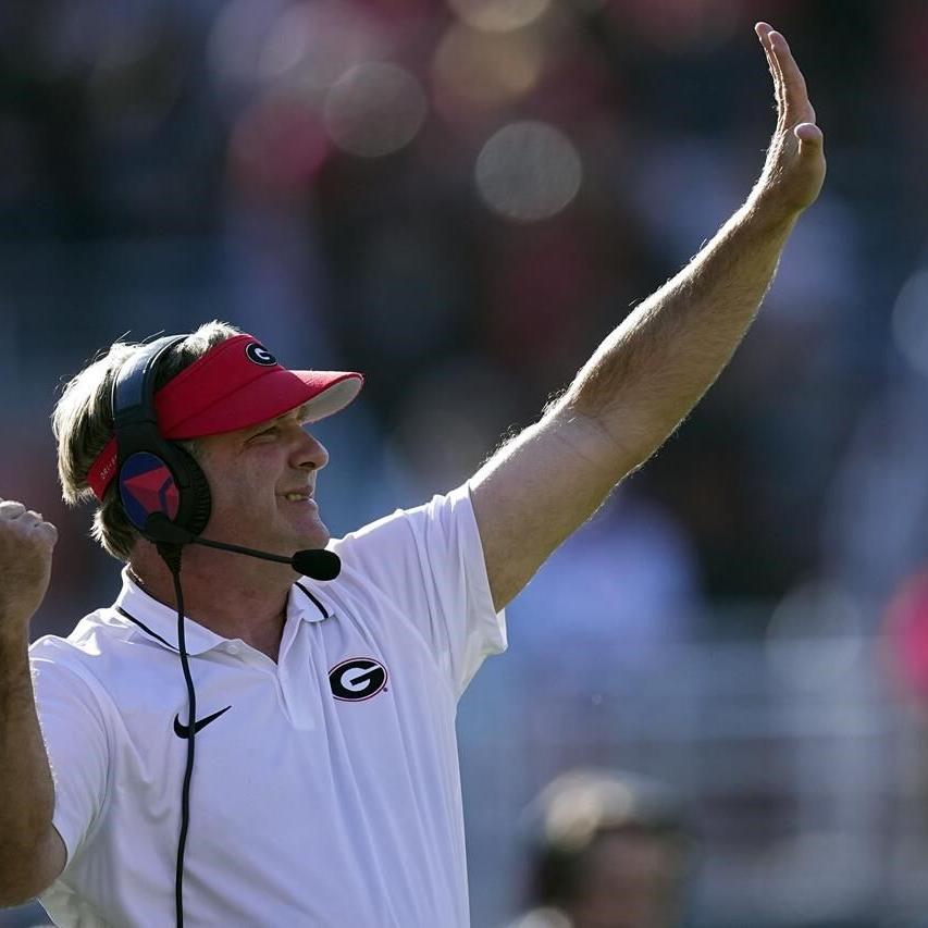 Beck throws and runs for TDs to launch new era as No. 1 Georgia