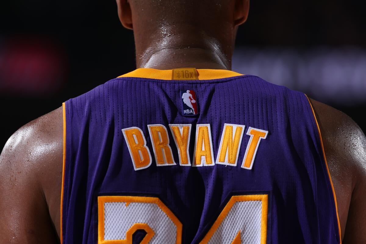 Magic Johnson Paid Tribute to Kobe Bryant With 2 Jersey Numbers