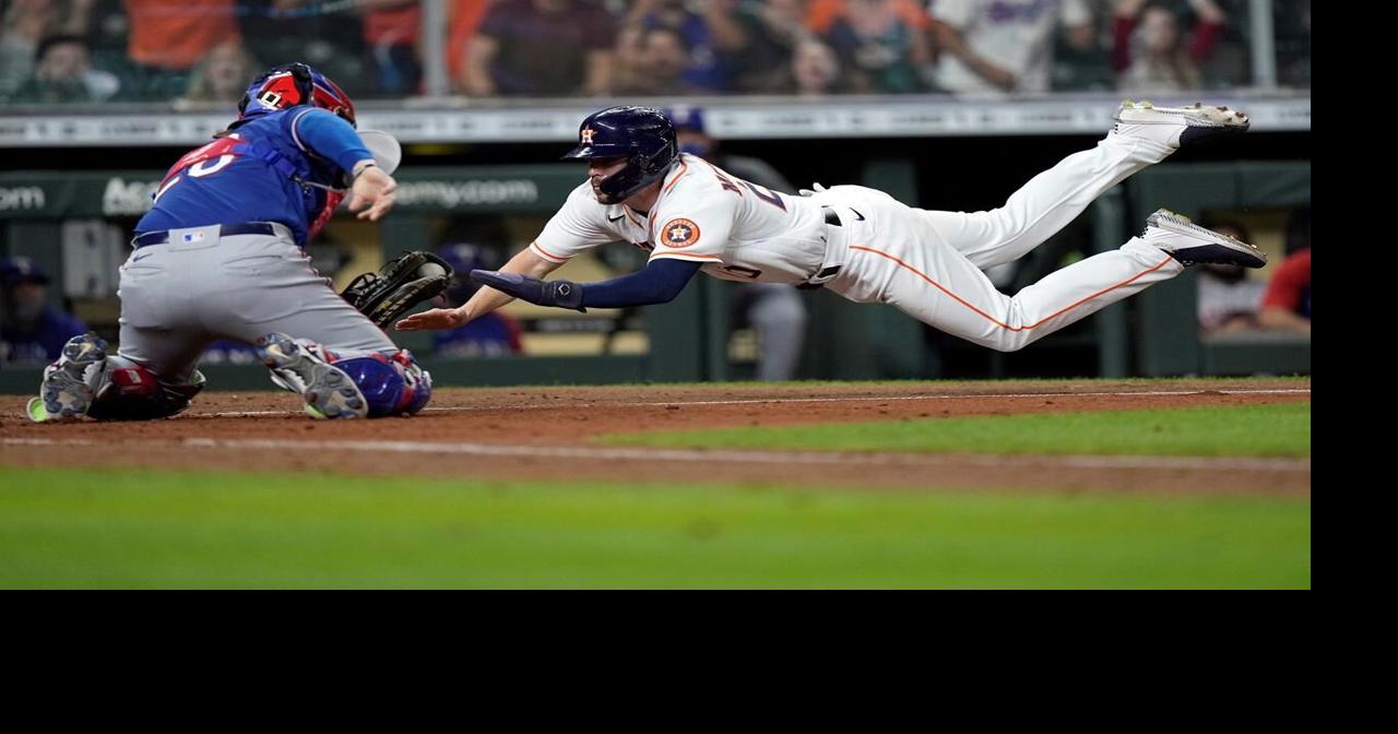 Straw scores on wild pitch in 11th, Astros beat Rangers 4-3