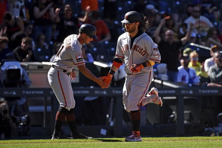 Giants overcome four-run deficit to beat Rockies