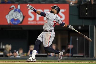Santana's sacrifice fly in 9th off All-Star closer Yates sends Twins past Rangers 3-2