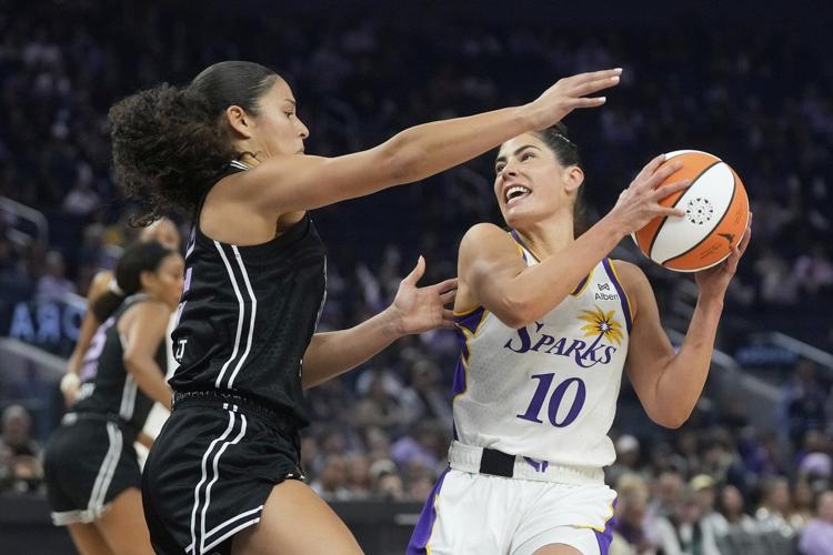 Kelsey Plum scores 37 points to lead the Sparks to an 84-67 win in the Valkyries' debut