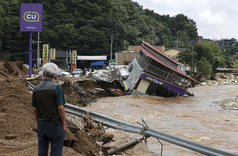 Heavy downpours in South Korea kill 14 and 12 others missing