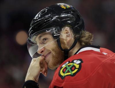 Patrick Kane being heavily pursued by Canadian team