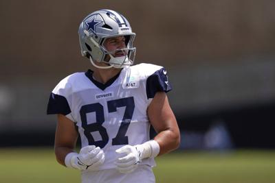 Cowboys TE Jake Ferguson leaves practice after being hit in the back