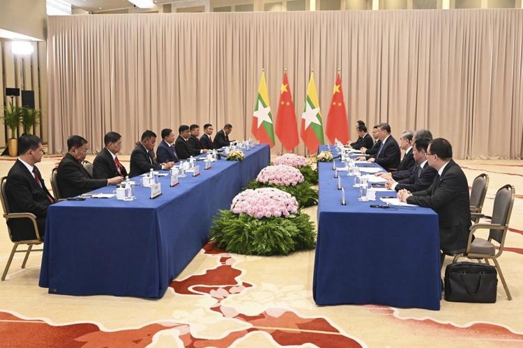 Myammar's military government chief has first meeting with China's leader since taking power in 2021