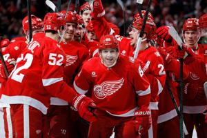 Kane passes Modano for most points by US-born NHL player in Red Wings' 4-3 shootout loss to Capitals