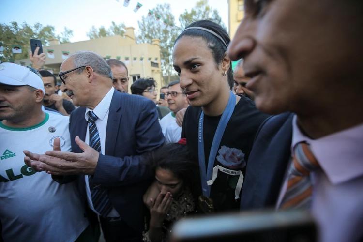 Gold medal boxer Imane Khelif hailed upon return to Algeria
