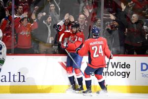 Pierre-Luc Dubois scores twice as the Capitals beat the Canucks 2-1 in overtime