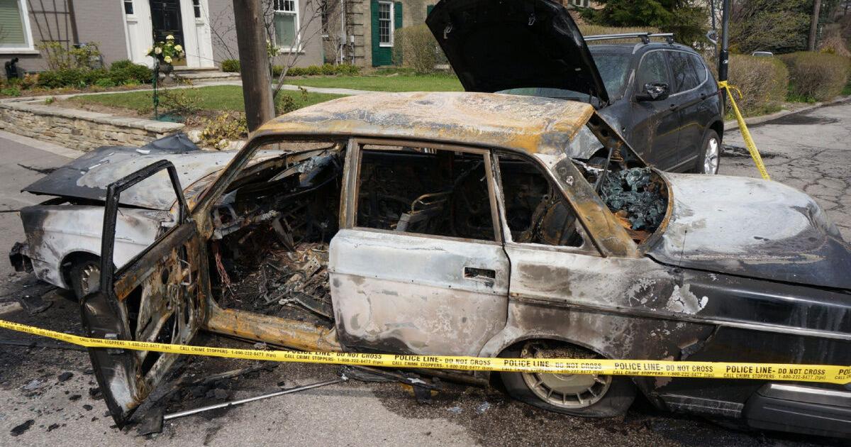 Toronto police release surveillance video after 12 vehicles, house torched