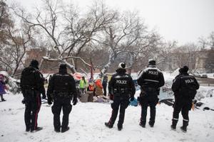 Obstruction charge withdrawn for Alberta reporter covering homeless camp clearing image