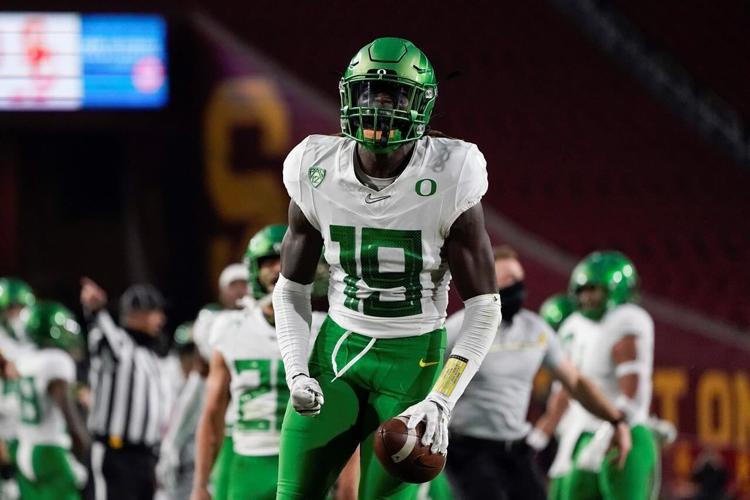 Oregon holds off USC late, grabs Pac12 title with 3124 win