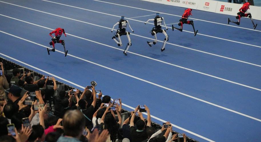 A robot sprinter shatters a 100-meter record again as sparks fly at ...
